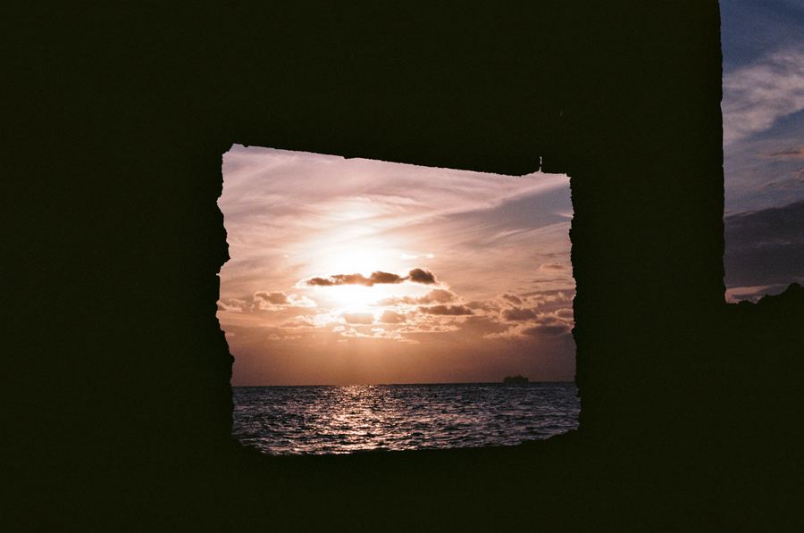 Sunset through a broken wall, II